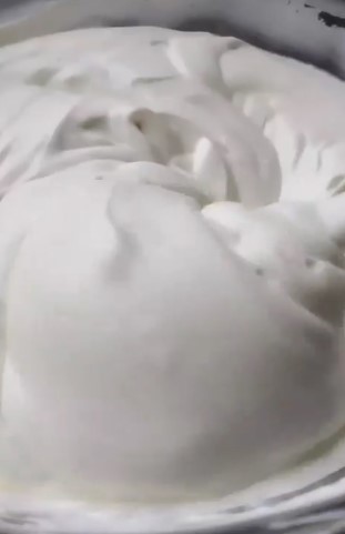 The Best Russian Honey Cake frosting in glass bowl