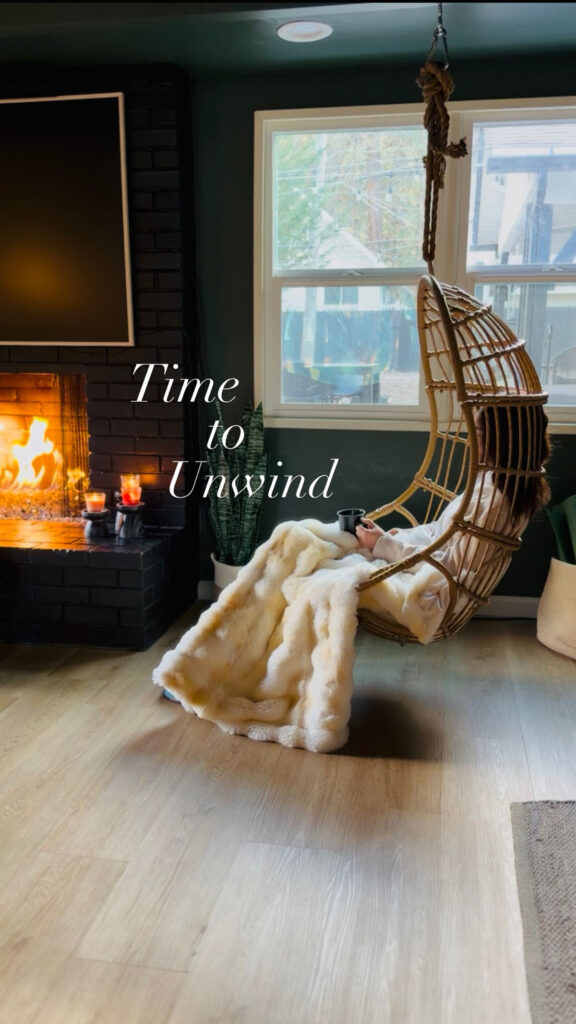 Red Wine Braised Beef w/ Garlic Mashed Potatoes - Time to Unwind - Girl indoor hammok with cozy fireplace with  cozy fuzzy white blanket.